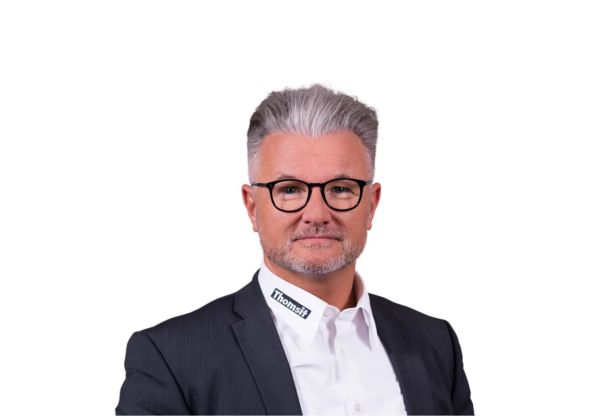 Andreas Baltronat, Thomsit